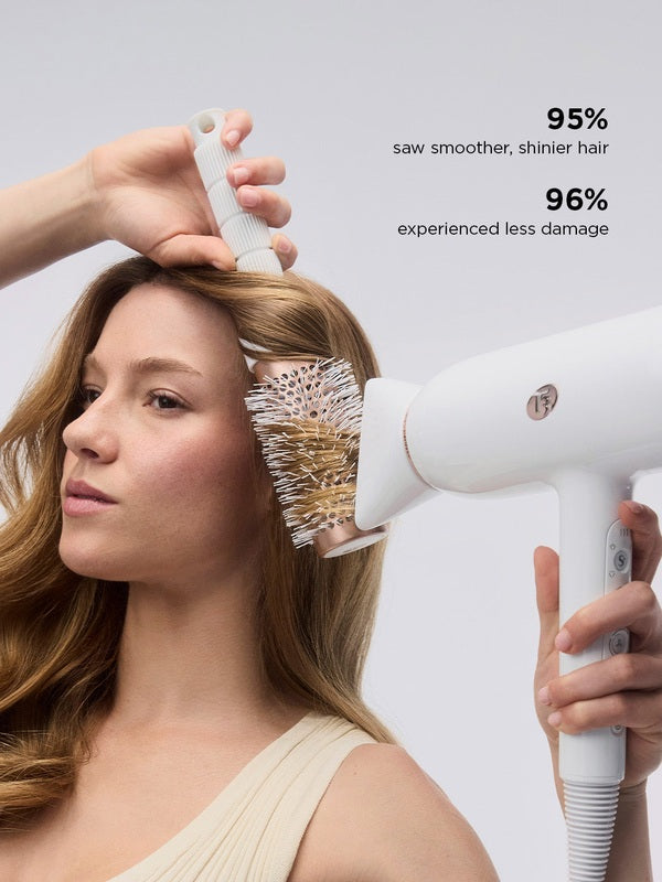 T3 Featherweight StyleMax Hair Dryer in use