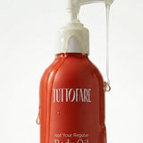 Tuttofare Not Your Regular Body Oil red bottle with pump on a cream background