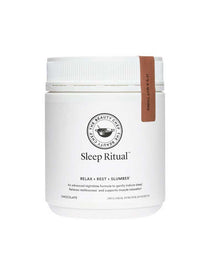 A white container of The Beauty Chef Sleep Ritual™ 150g chocolate powder sleep supplement with a brown tag on the lid. The label states it supports relaxation and restful sleep, featuring magnesium glycinate for additional benefits.