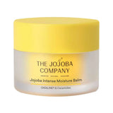 The Jojoba Company Jojoba Intense Moisture Balm in a short frosted jar with a bright yellow lid and yellow label.
