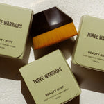 Three Warriors Beauty Buff Brush in sunlit packaging
