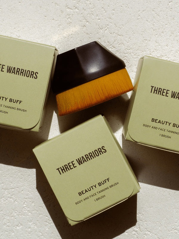 Three Warriors Beauty Buff Brush in sunlit packaging