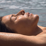 Woman relaxing poolside with a sun kissed glow