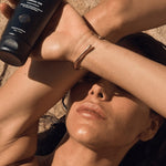 Woman holding Three Warriors Gradual Tan outdoors