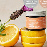 Thrive Tallow Scented Whipped Tallow Moisturiser jar styled with fresh lemon halves and lavender, with Clean and Conscious Awards badges above.