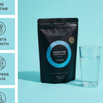 Tropeaka Creatine Monohydrate with a glass of water