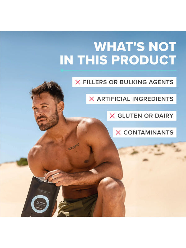 Man outdoors holding Tropeaka Creatine Monohydrate