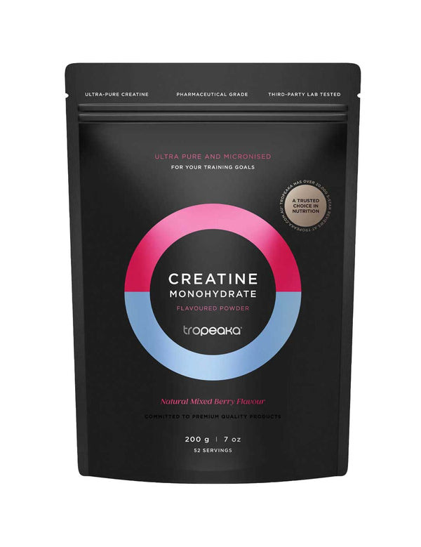 Tropeaka Creatine Monohydrate Mixed Berry 200g comes in a black pouch with pink, blue, and white circular graphics. It features a Natural Mixed Berry Flavour to support muscle strength and includes 52 servings per pack.