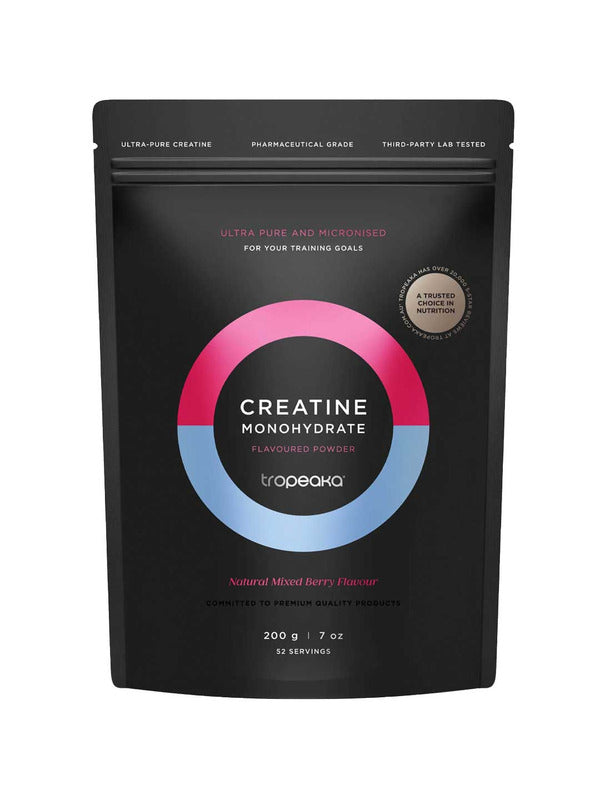 Tropeaka Creatine Monohydrate Mixed Berry 200g comes in a black pouch with pink, blue, and white circular graphics. It features a Natural Mixed Berry Flavour to support muscle strength and includes 52 servings per pack.