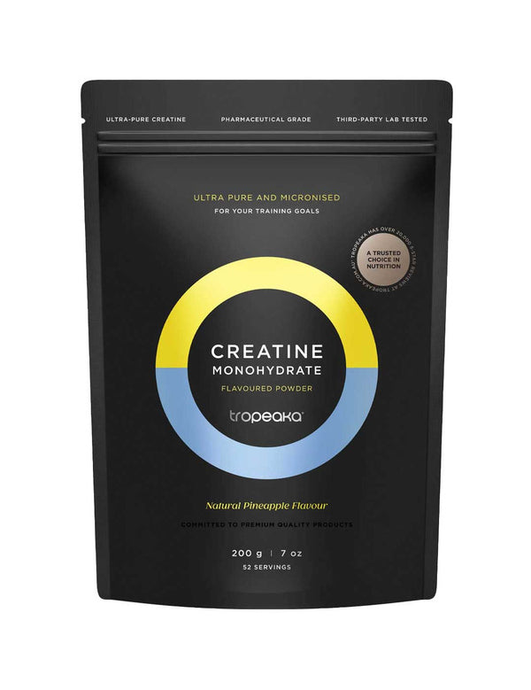 A black pouch of Tropeaka Creatine Monohydrate Pineapple 200g offers 52 servings of ultra-pure, micronized creatine with natural pineapple flavour to support muscle strength. The packaging features yellow and blue accents.