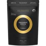 Black resealable Tropeaka Organic Maca Powder pouch with a gold circular design framing the product name in white.