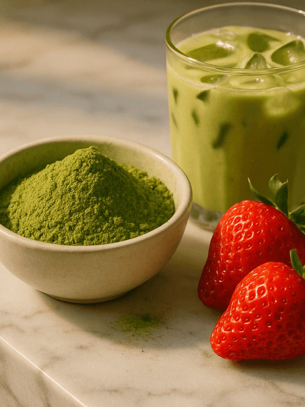 Tropeaka Strawberry Matcha Powder with fresh strawberries