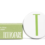 Tuttofare Sicilian Citrus Tallow Balm tin and box on a cream background