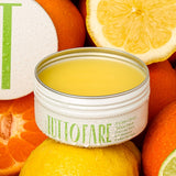 Tuttofare Sicilian Citrus Tallow Balm among fresh citrus fruit
