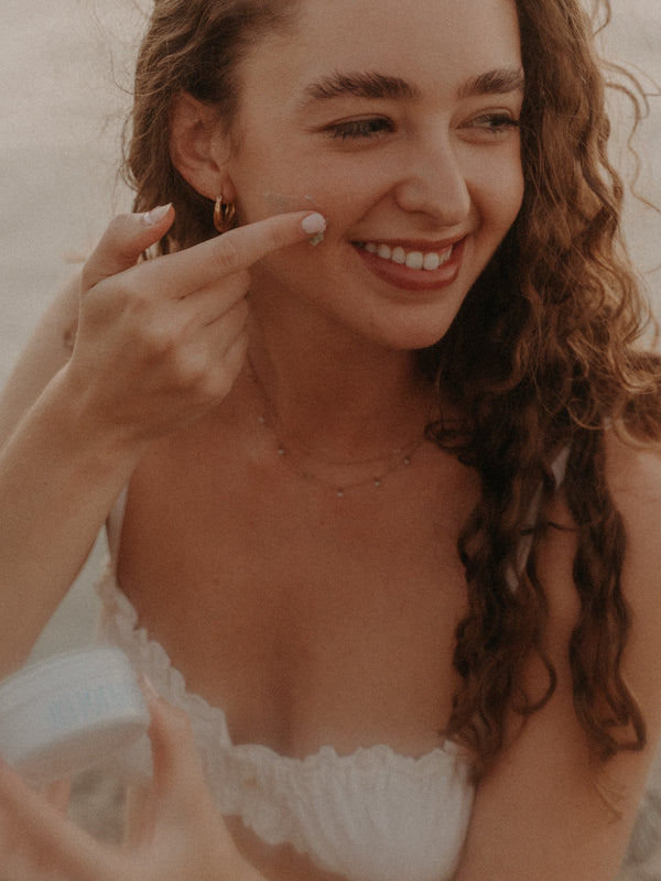 Woman applying Tuttofare Roman Blue Tallow Balm