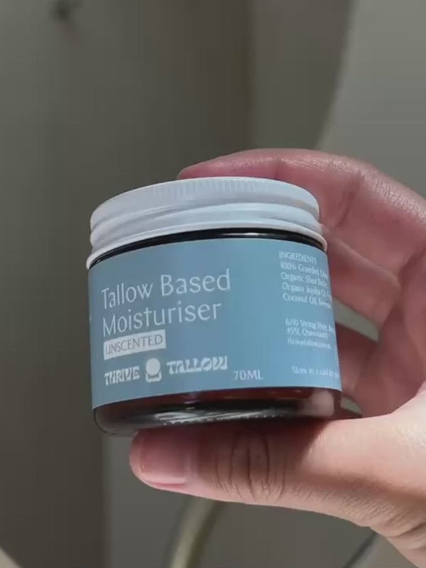 Hand holding Unscented Tallow Based Moisturiser – Thrive Tallow Based Moisturiser Unscented 70ml