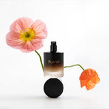 Metamorphosis Formë 50ml perfume with flowers