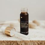 Vanessa Megan Pineapple Enzyme Eyelift Serum bottle on stone