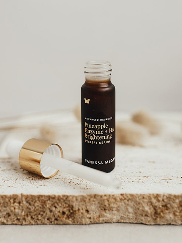 Vanessa Megan Pineapple Enzyme Eyelift Serum bottle on stone
