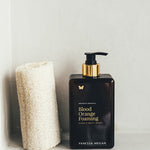 Vanessa Megan Blood Orange and Vetiver Body Wash pump bottle in the bathroom