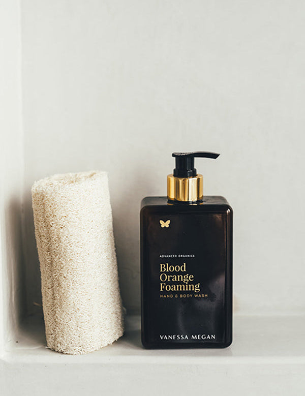 Vanessa Megan Blood Orange and Vetiver Body Wash pump bottle in the bathroom