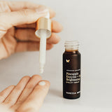 Dropper of Vanessa Megan Pineapple Enzyme Brightening Eyelift Serum in hand