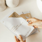 Vanessa Megan Gold and Lime Caviar Sheet Mask sachet in hand