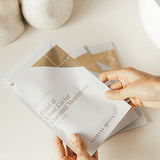 Vanessa Megan Gold and Lime Caviar Sheet Mask sachet in hand