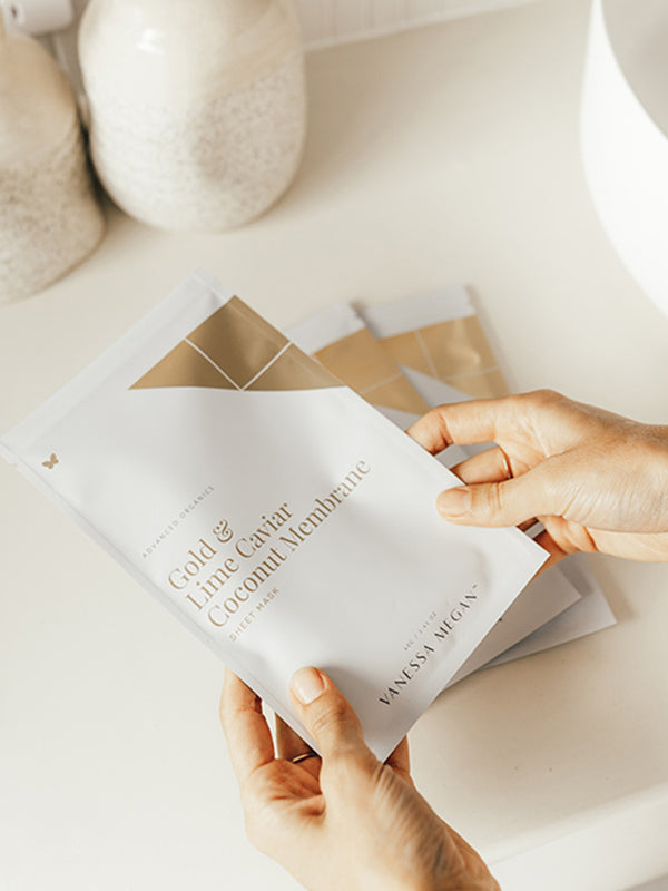 Vanessa Megan Gold and Lime Caviar Sheet Mask sachet in hand