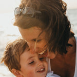 Mother and child relaxing together from The Vitalogy Project Sleep Health page