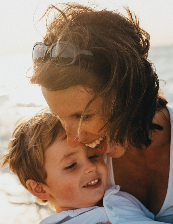 Mother and child relaxing together from The Vitalogy Project Sleep Health page