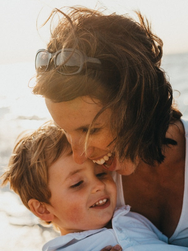 Mother and child relaxing together from The Vitalogy Project Sleep Health page
