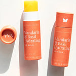 Open jar of Vanessa Megan Mandarin and Basil Hydrating Lip Balm