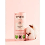 Deodorant Stick Sensitive, next to almond blossom, against pink background.