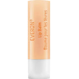 Weleda Everon Lip Balm 8ml features a beige cap, white base, and orange text reading "EVERON Lip Balm" and "Baume pour les lèvres" on its moisturizing, natural formula.