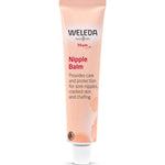 Peach Weleda Mum Nipple Balm tube with dark pink lettering and a small white ribbed cap.