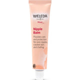 Peach Weleda Mum Nipple Balm tube with dark pink lettering and a small white ribbed cap.