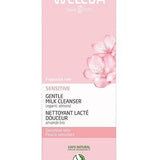 Front of the pink Weleda Sensitive Gentle Milk Cleanser 75ml carton with almond blossom artwork and product details.