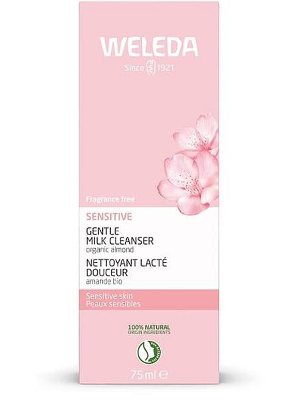Front of the pink Weleda Sensitive Gentle Milk Cleanser 75ml carton with almond blossom artwork and product details.