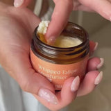 Hand taking Whipped Tallow Moisturiser from the jar – Thrive Tallow Whipped Tallow Moisturiser Scented 70ml