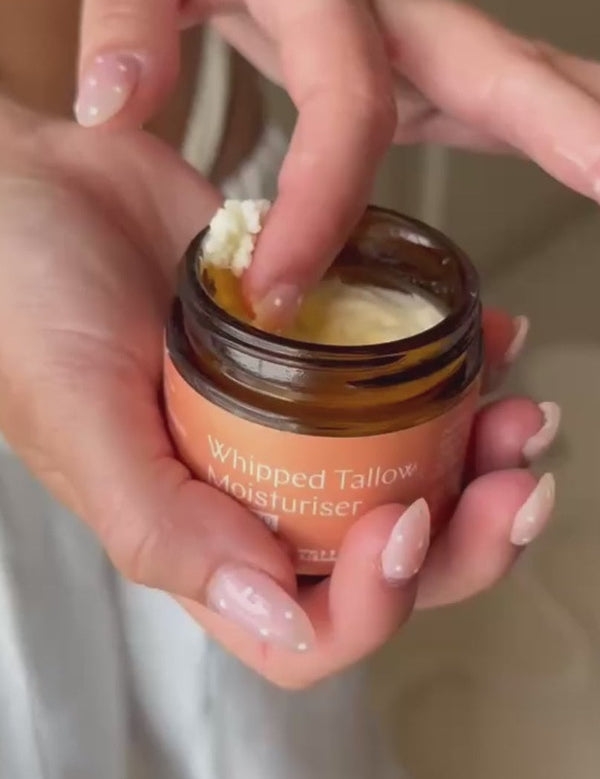 Hand taking Whipped Tallow Moisturiser from the jar – Thrive Tallow Whipped Tallow Moisturiser Scented 70ml
