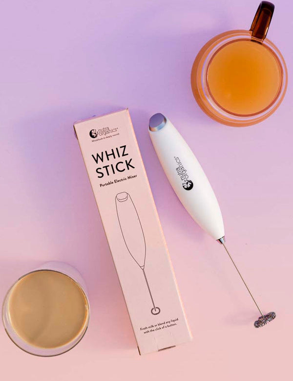 Nutra Naturals Whiz Stick frothing a latte