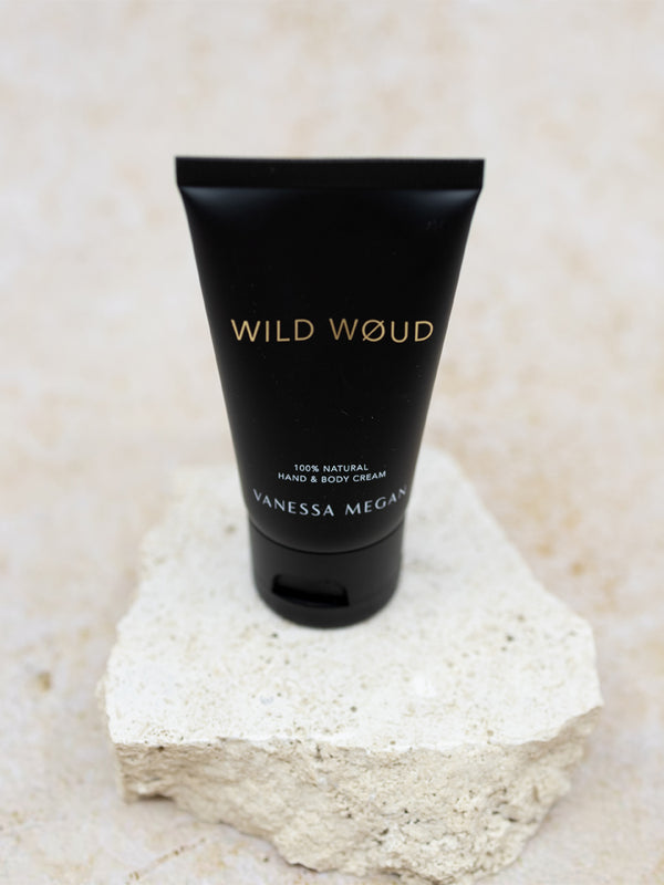Vanessa Megan Wild Woud Perfume Hand and Body Cream tube on stone
