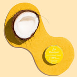 WooHoo Mellow deodorant paste styled with coconut on a yellow background