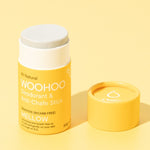 Open WooHoo Mellow deodorant stick styled on a yellow background