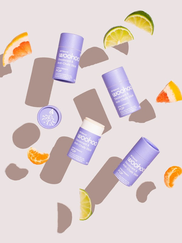 WooHoo Pop deodorant sticks styled with colourful citrus slices