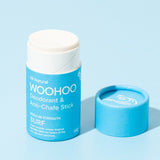 Open WooHoo Surf deodorant stick styled on a blue background