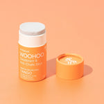Open WooHoo Tango deodorant stick styled on a peach background