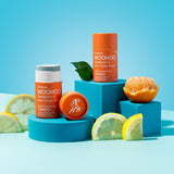 WooHoo Tango deodorant sticks styled with citrus on bright blue blocks