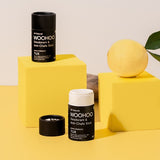 WooHoo Tux deodorant sticks styled with lemon on yellow blocks